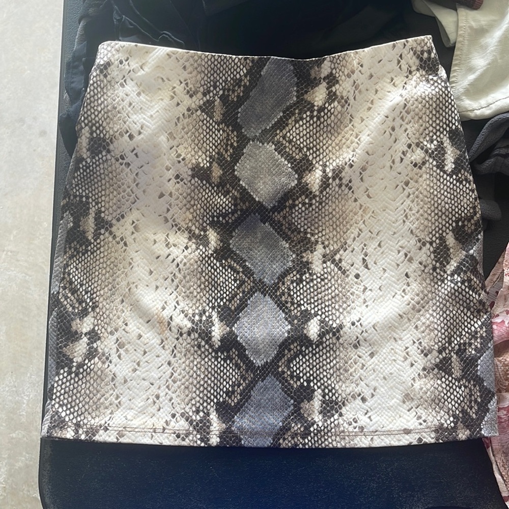 snakeskin skirt, stretchy material, size small